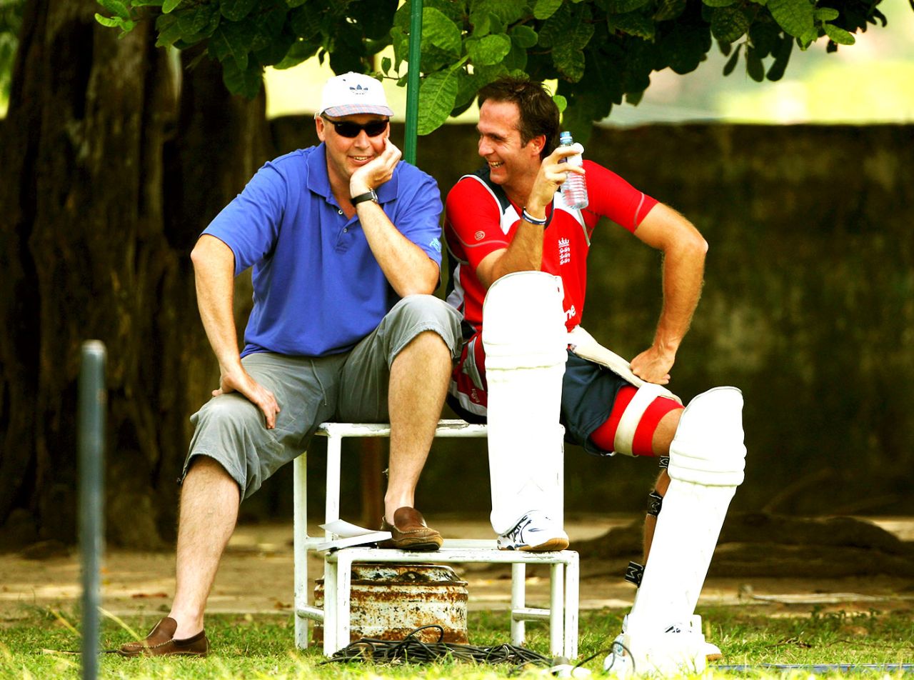 Angus Fraser and Michael Vaughan chat during a net session at the NCC Cricket Club, Colombo
