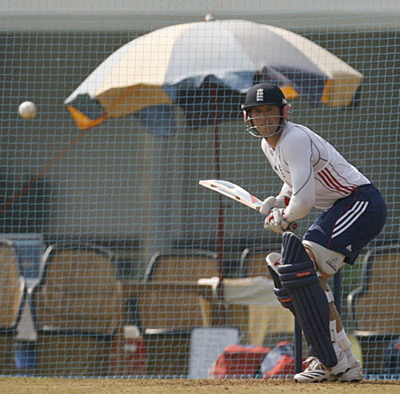 Matt Prior waits for a delivery in the nets, overlooked by an umbrella, Mumbai, November 10, 2008
