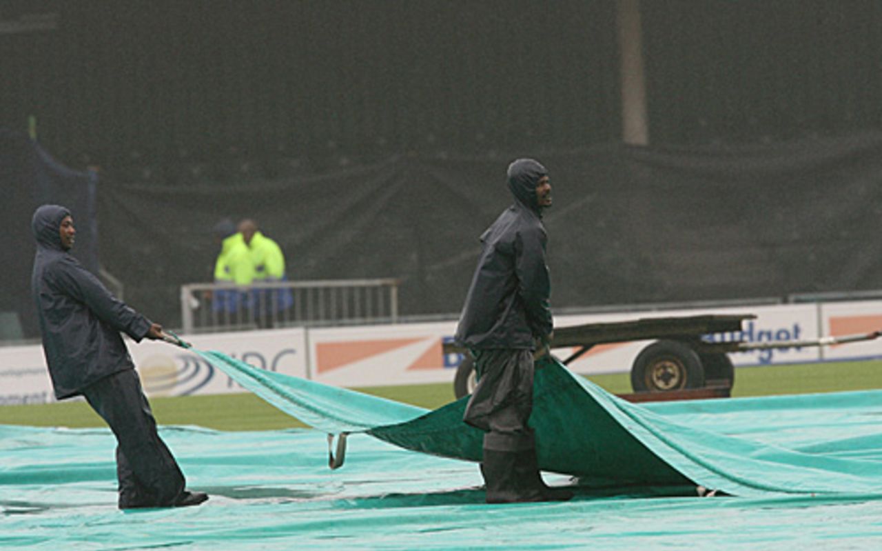 A washout at East London where groundsmen drag the sheets onto the square, South Africa v Bangladesh, 3rd ODI, East London, November 12, 2008