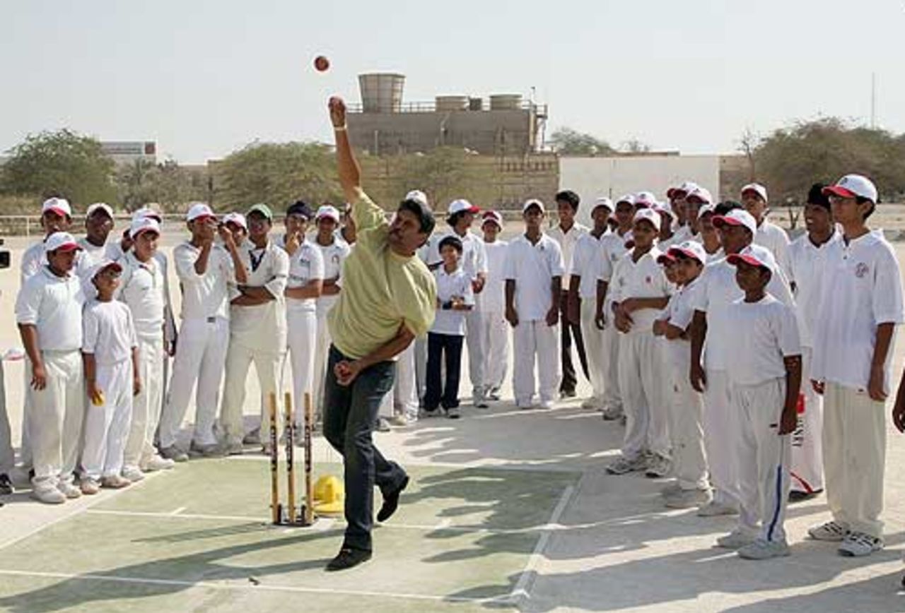 Kapil Dev bowls at a clinic for youth players in Bahrain, Riffa, Bahrain, November 12, 2008