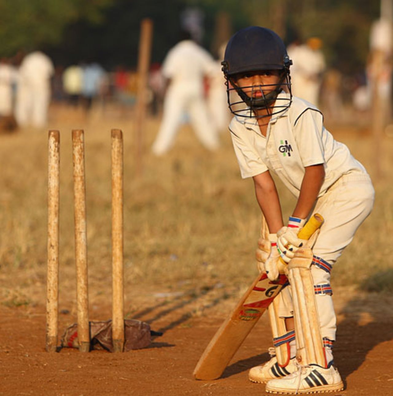 A young cricketer gets some batting practice at Shivaji Park, Mumbai, November 14, 2008