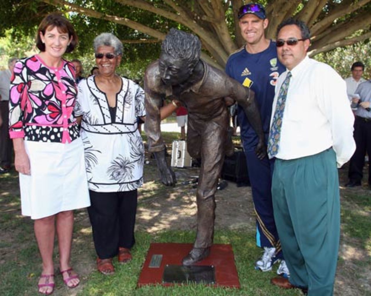 Judy Spence, Valda Coolwell, Matthew Hayden and Larry Budd pose after the unveiling of a statue of Eddie Gilbert, Allan Border Field, Brisbane, November 16, 2008