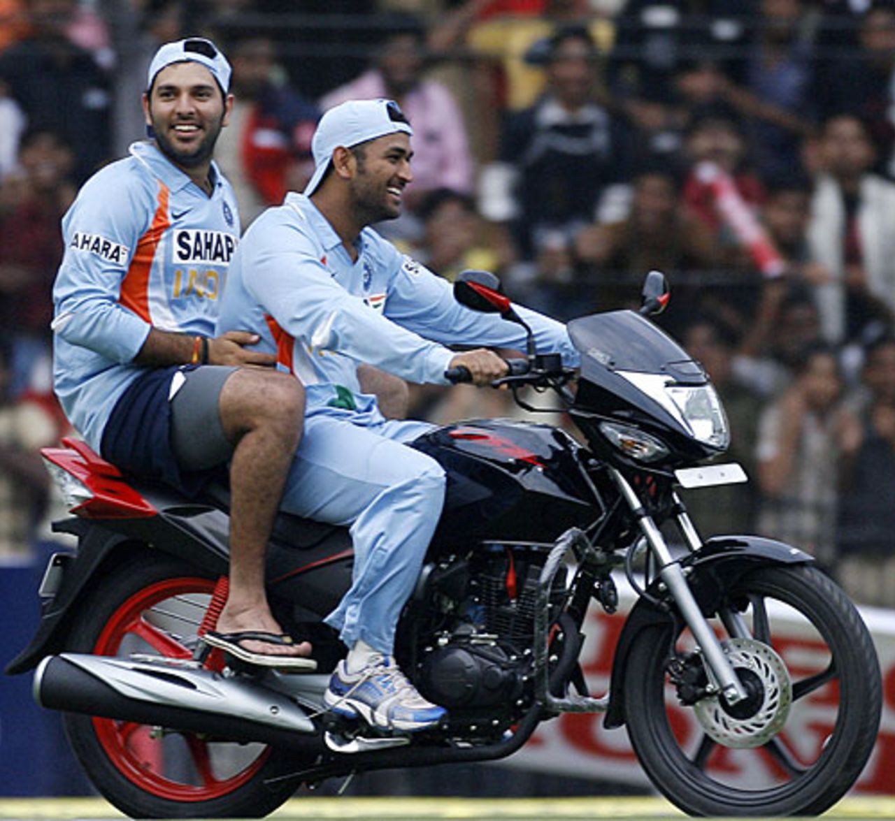 Mahendra Singh Dhoni takes Yuvraj Singh on a ride around the ground on the motorbike Yuvraj won as the Man of the Match, India v England, 2nd ODI, Indore, November 17, 2008