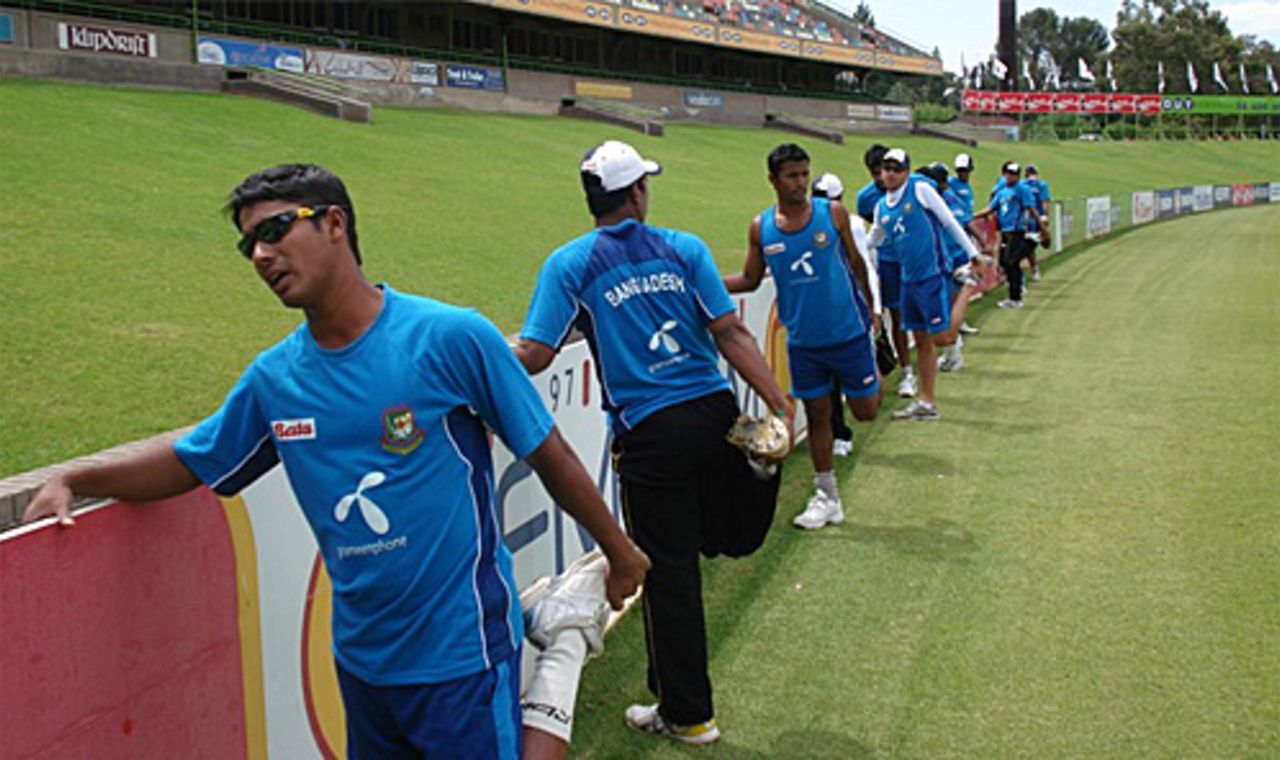 Bangladesh's players stretch against the hoardings ahead of the first Test against South Africa, Bloemfontein, November 18, 2008