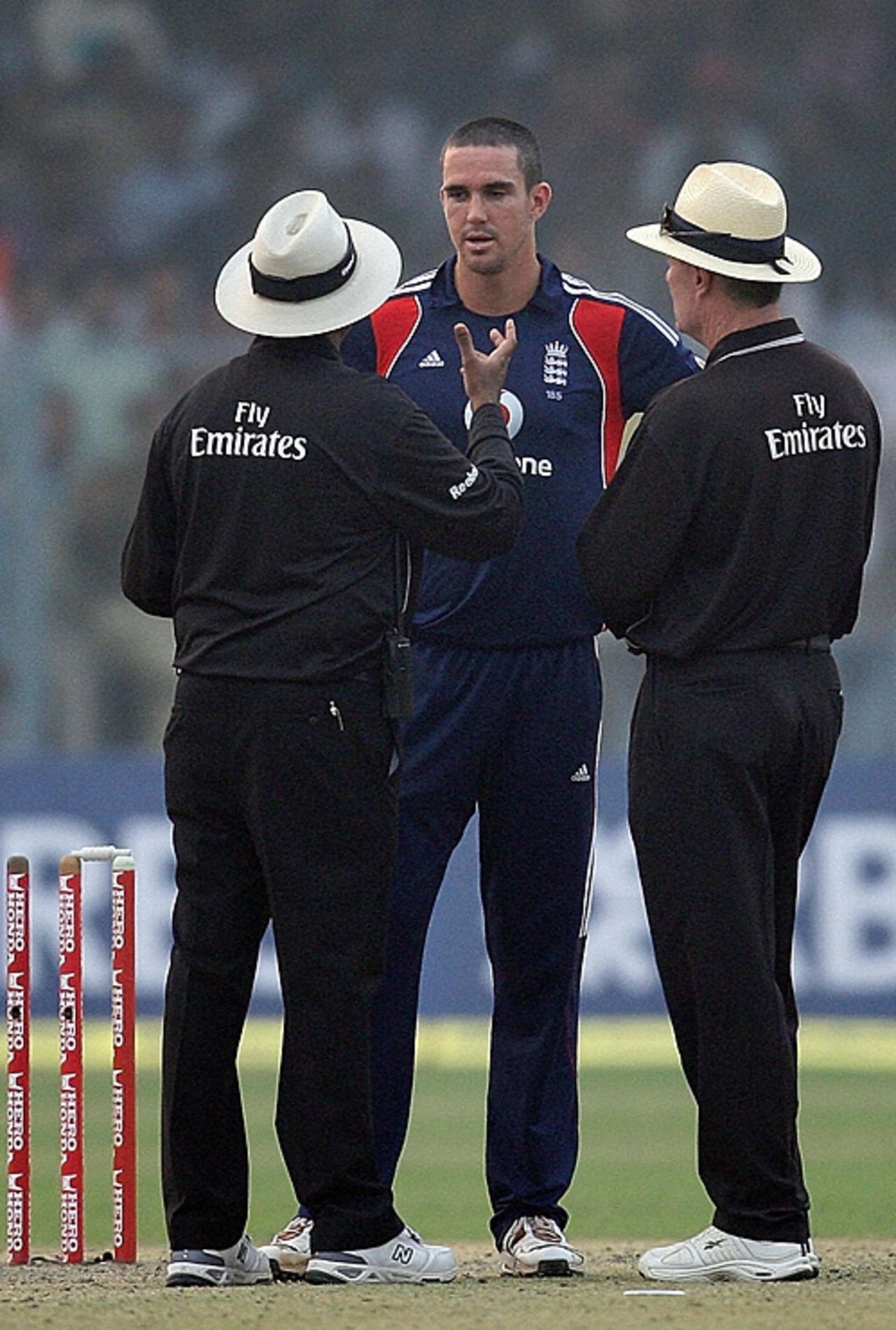 A frustrated Kevin Pietersen chats to the umpires when bad light curtailed the third ODI against India, India v England, 3rd ODI, Kanpur, November 20, 2008