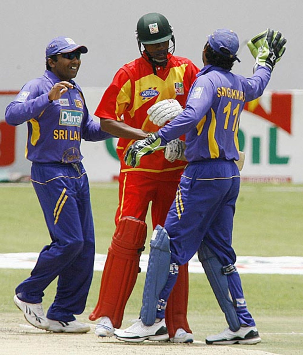 Kumar Sangakkara and Mahela Jayawardene celebrate a Zimbabwe wicket, Zimbabwe v Sri Lanka, 1st ODI, Harare, November 20, 2008