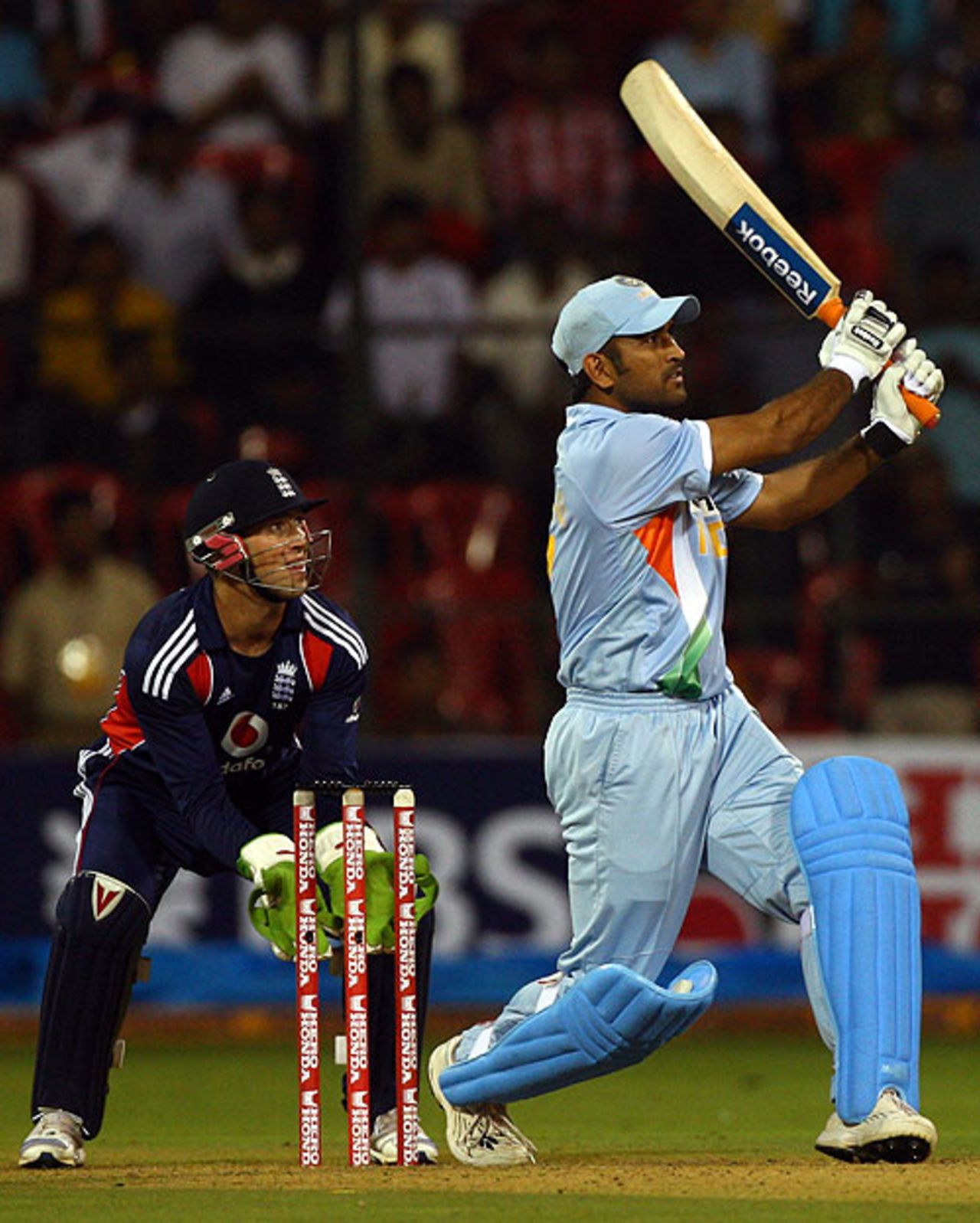 Mahendra Singh Dhoni swats a six over midwicket, India v England, 4th ODI, Bangalore, November 23, 2008