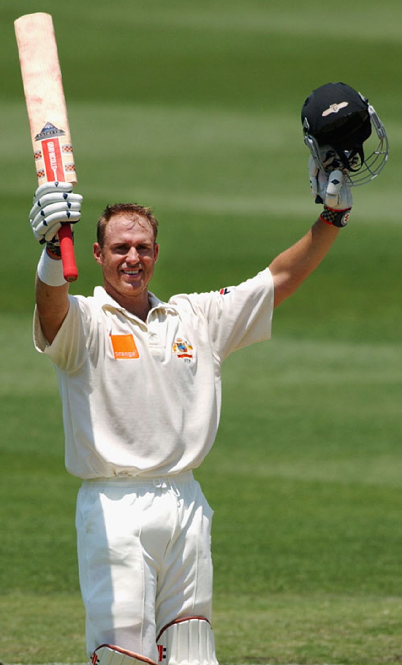 Matthew Hayden raises his bat after reaching his second century in the match, Australia v England, 1st Test, Brisbane, 4th day, November 10, 2008