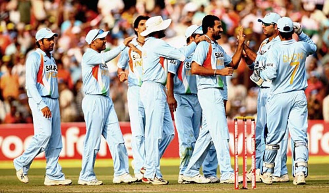 Team-mates congratulate Zaheer Khan on dismissing Alastair Cook, India v England, 5th ODI, Cuttack, November 26, 2008