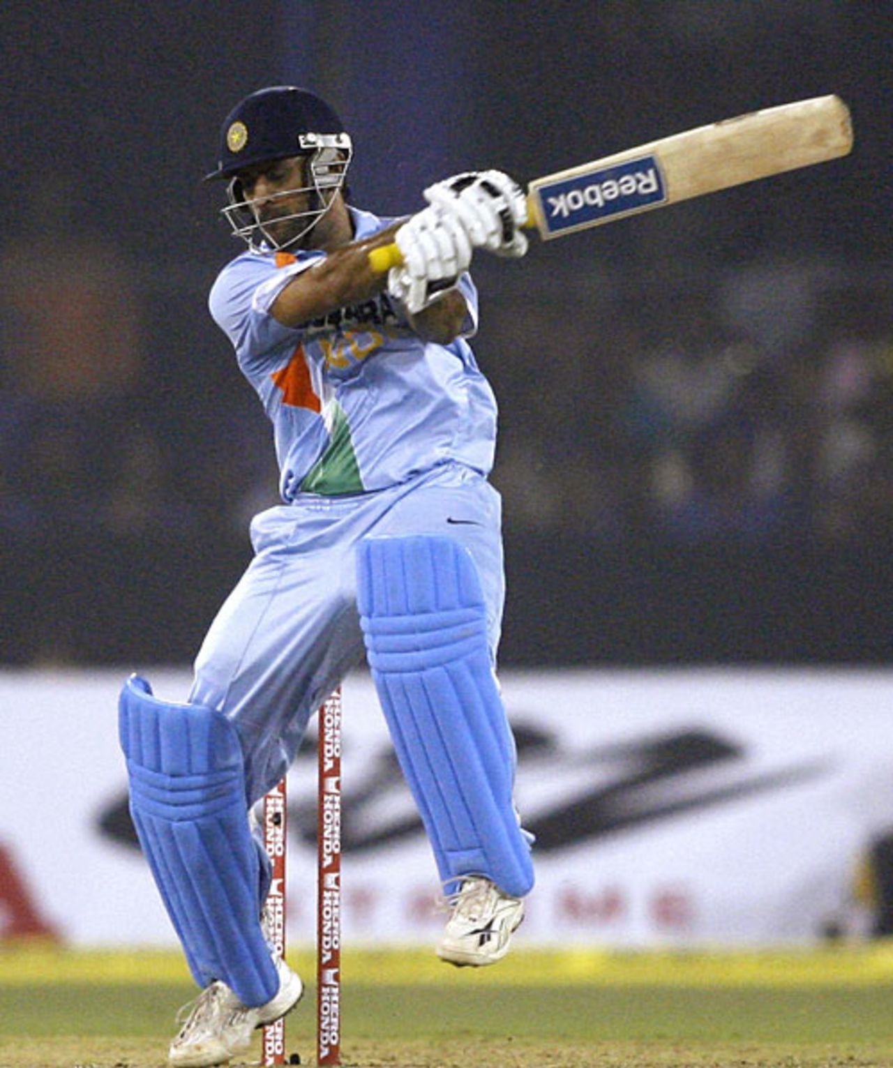 Mahendra Singh Dhoni plays a cut shot during his half-century, India v England, 5th ODI, Cuttack, November 26, 2008