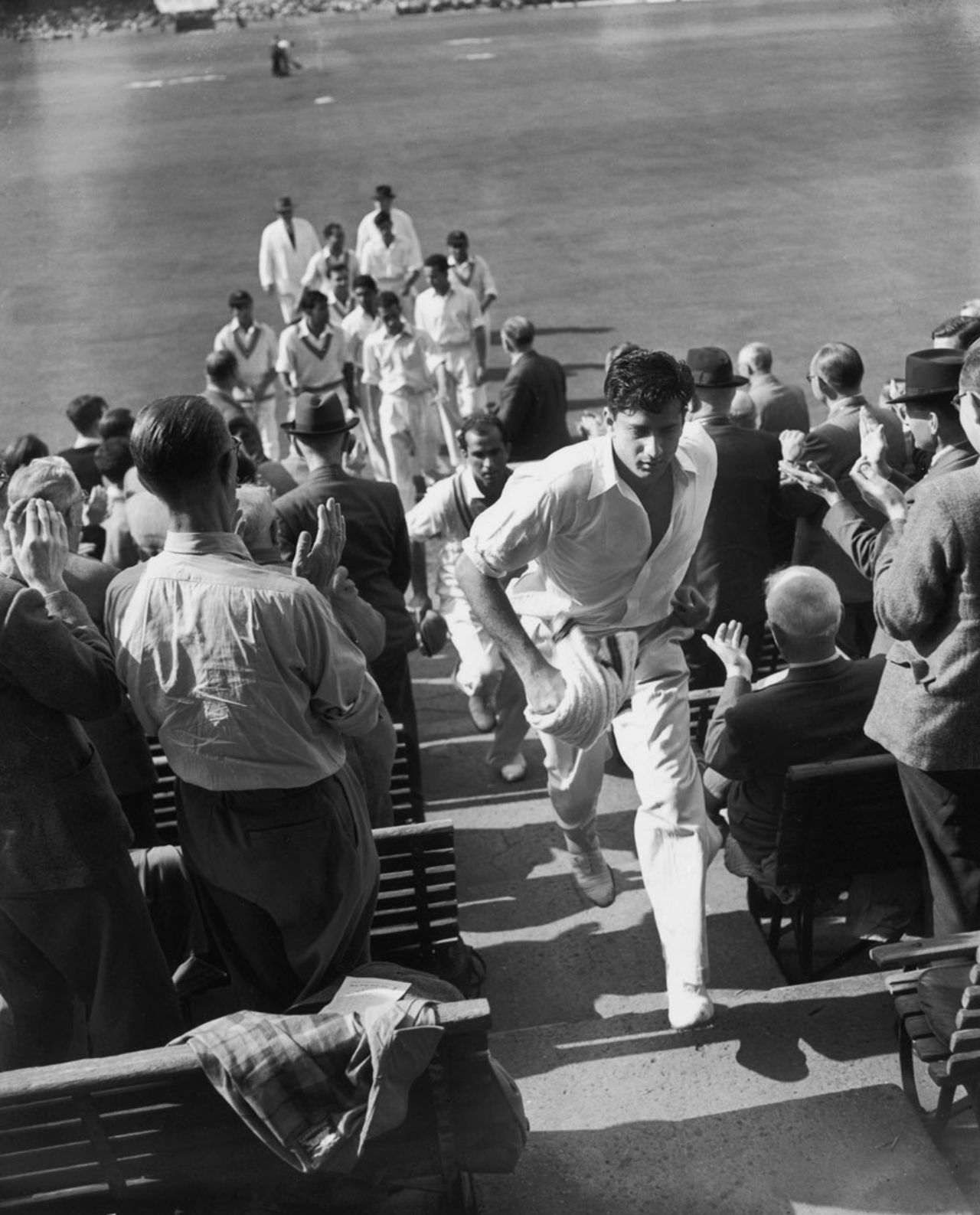 The Pakistan team, led out by Fazal Mahmood, leave the ground after levelling the series, England v Pakistan, 4th Test, The Oval, 5th day, August 17, 1954