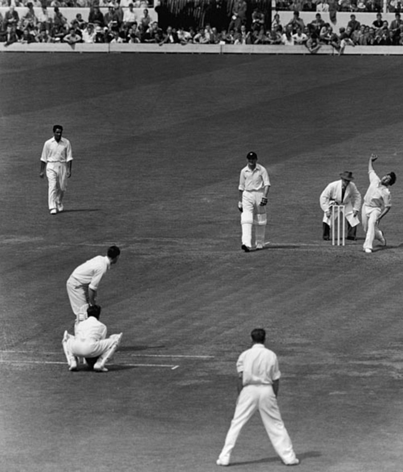 Fred Trueman bowls for Yorkshire, 1953