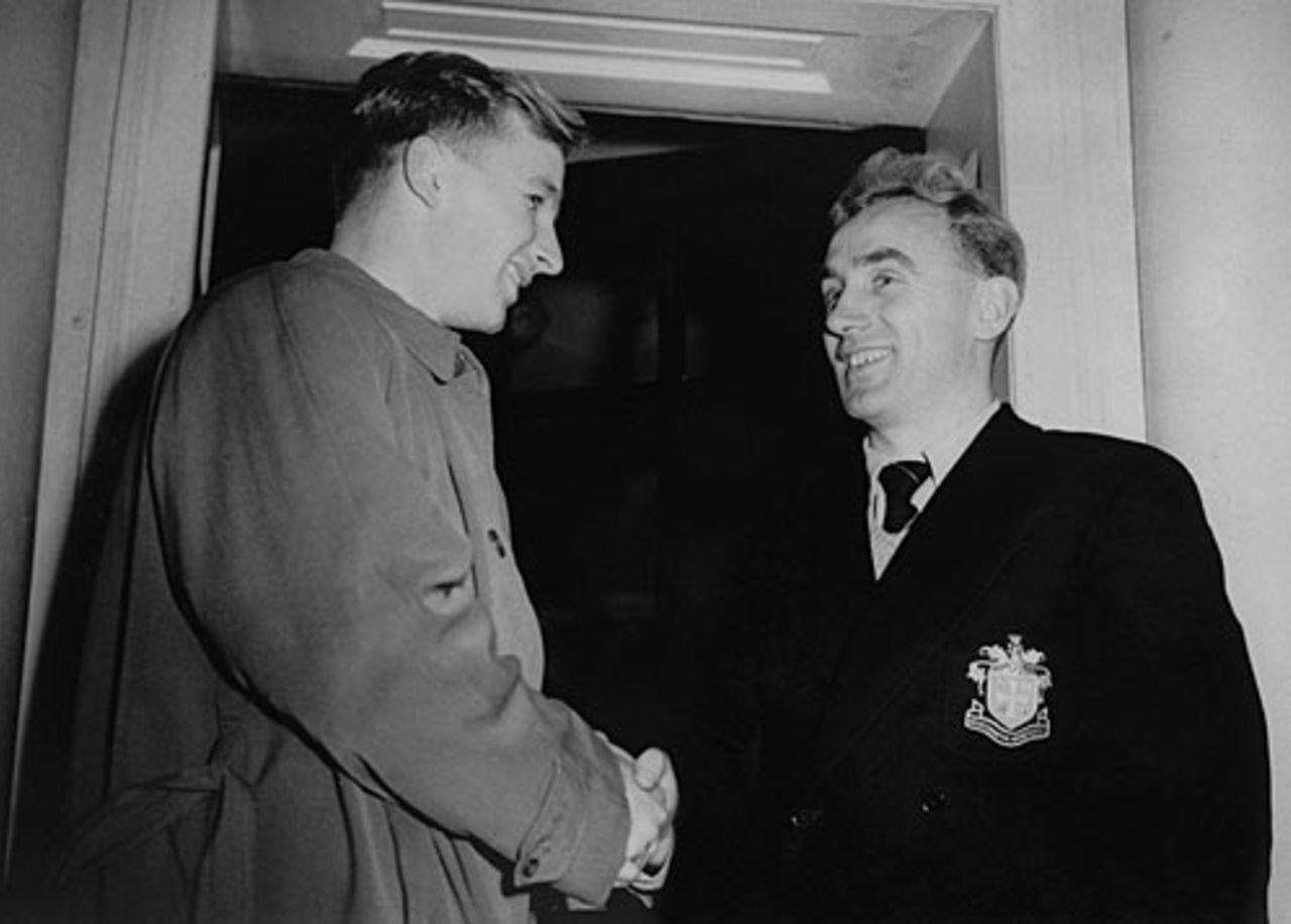Double international Arthur Milton (left) is congratulated by Billy Wright on making the England football team, November 27, 1951