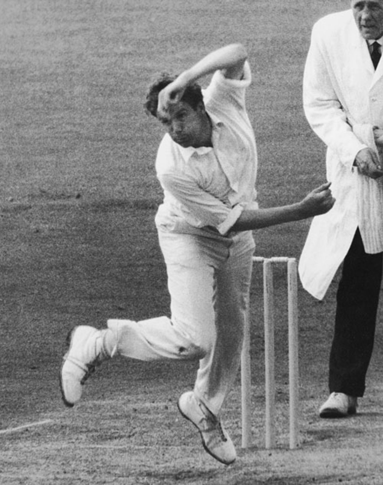 Dusty Rhodes bowls during his four-wicket haul, Surrey v Derbyshire, County Championship, The Oval, 2nd day, May 9, 1966