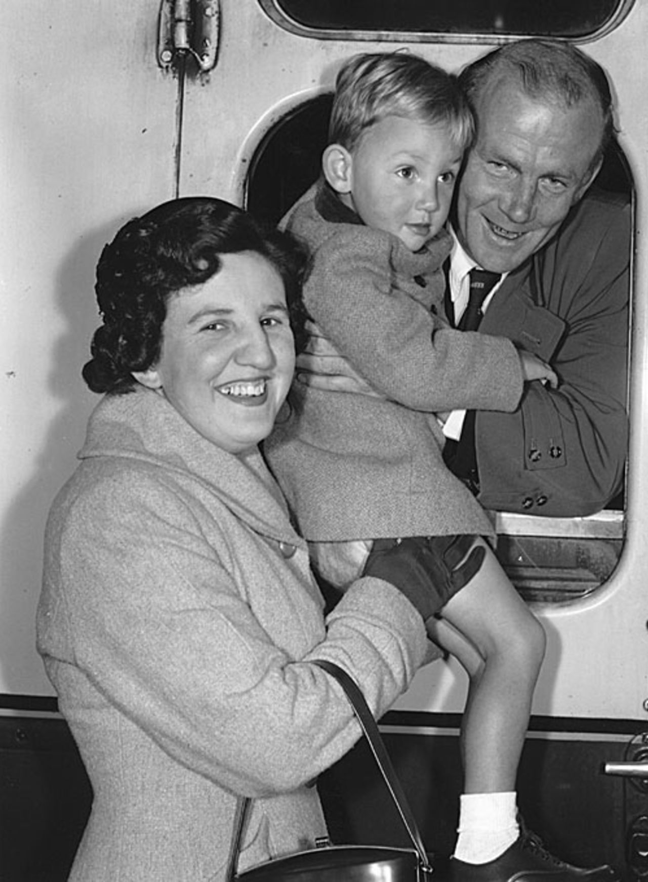 Tony Lock poses with his wife Audrey and son Graham before leaving for South Africa, Waterloo, October 4, 1956