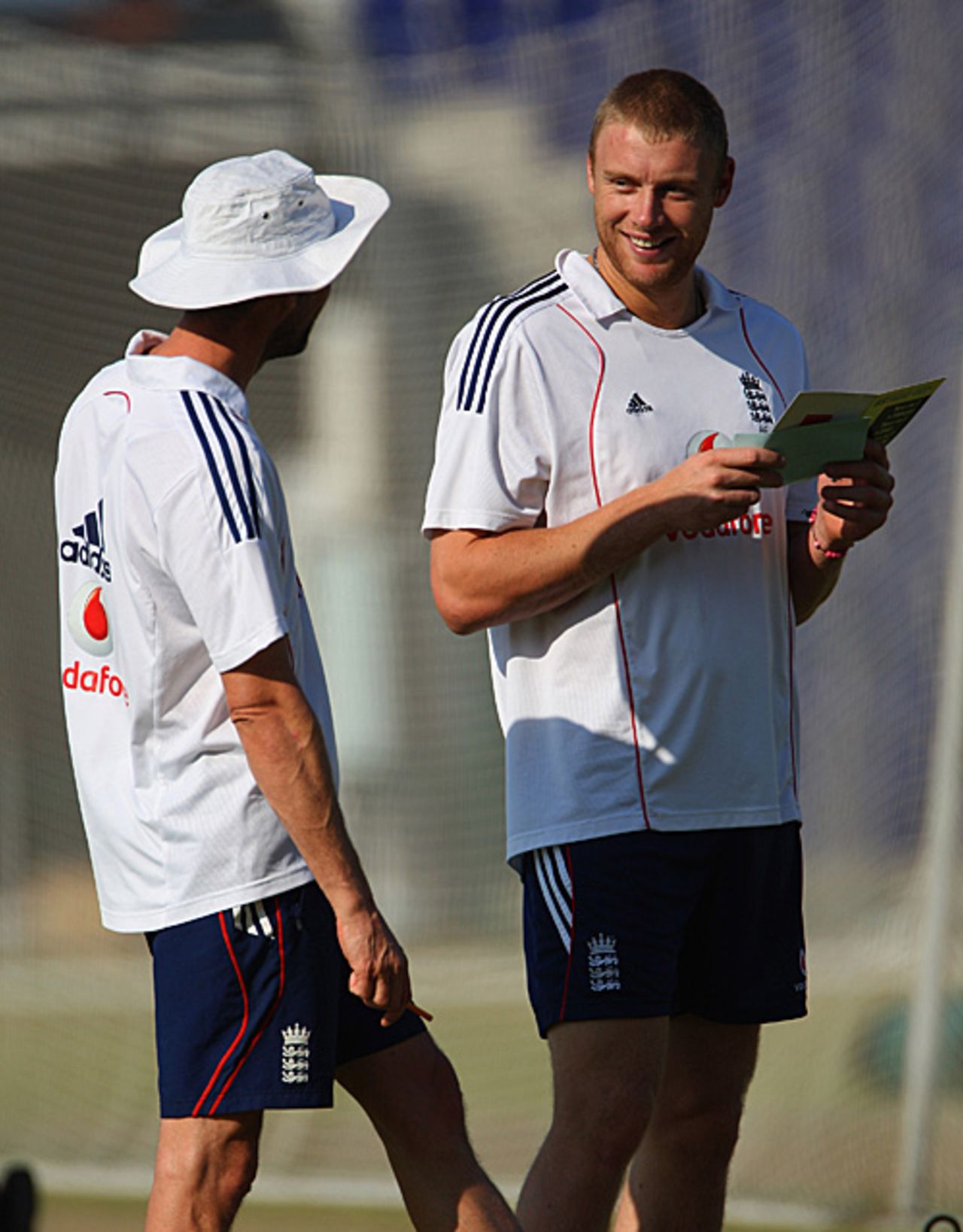 Mark Saxby, England's team massage therapist, shares a joke with Andrew Flintoff, Sheikh Zayed Stadium, December 6, 2008