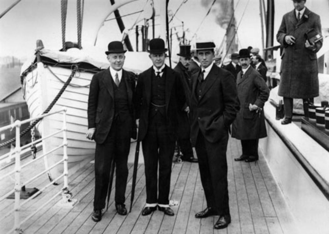 Henry Leveson Gower (left) and Pelham Warner wave goodbye to Johnny Douglas as he leaves for a tour of South Africa, November 1, 1913