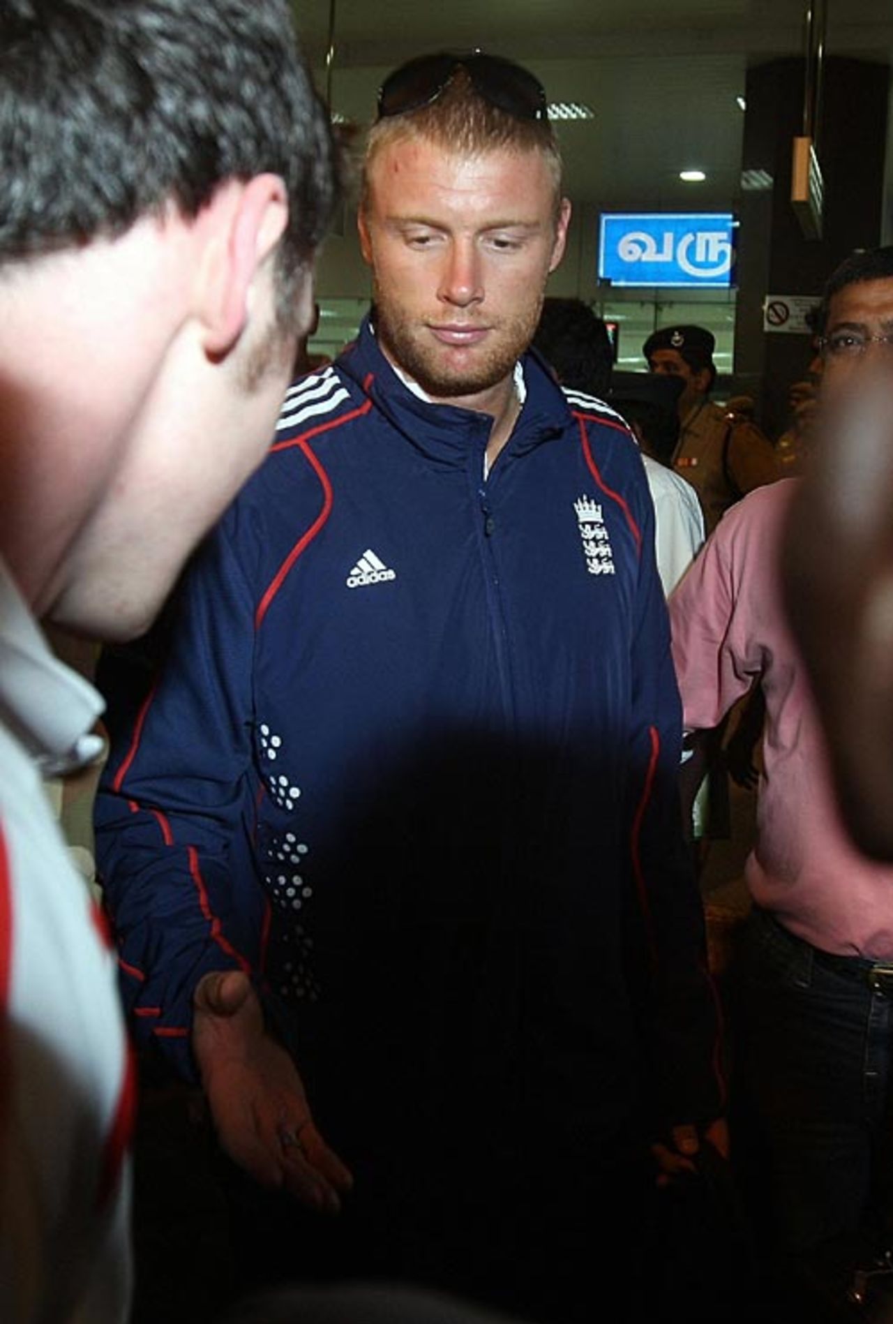 Andrew Flintoff makes his way through the heavy security at the airport, December 8, 2008