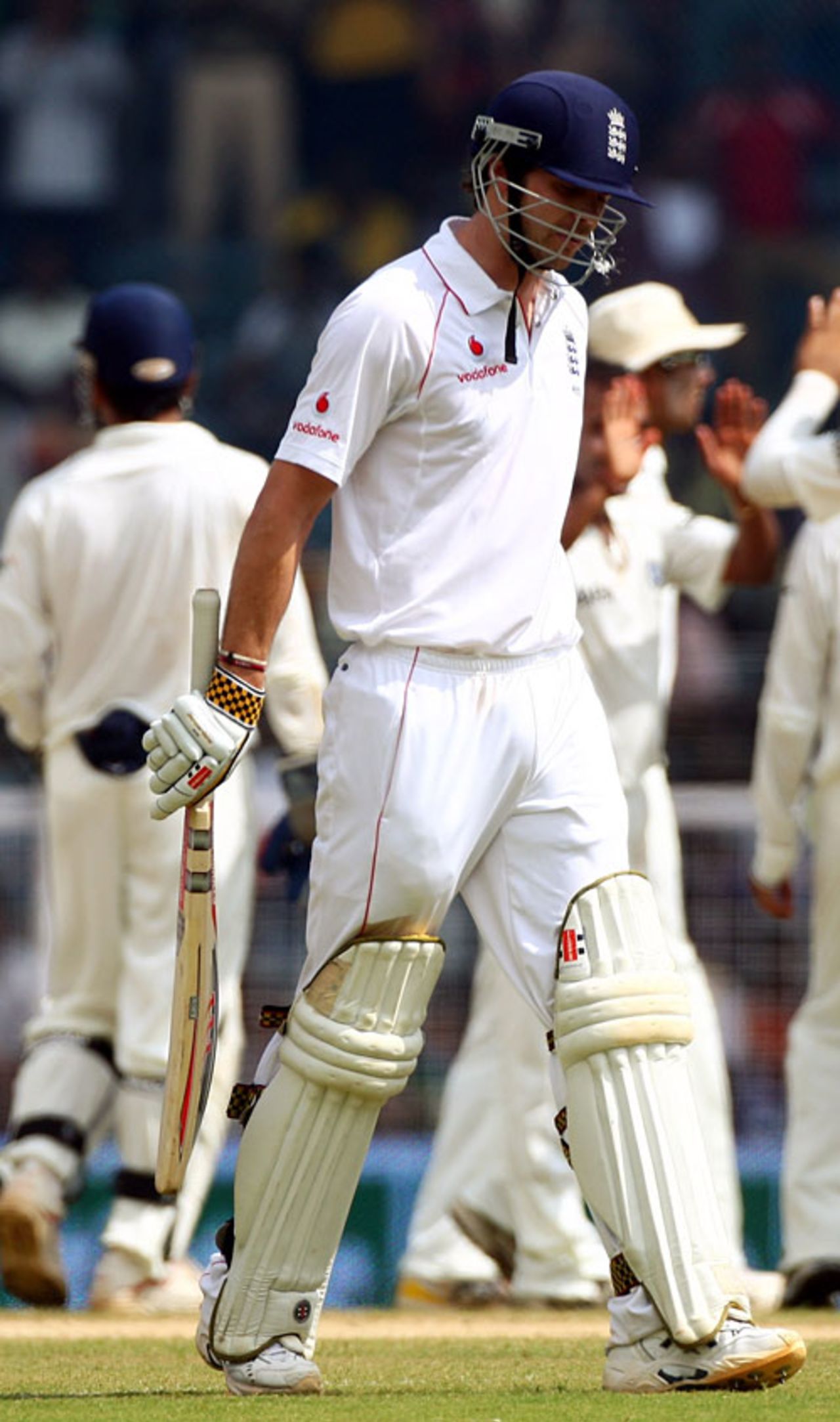 James Anderson walks back after falling to Amit Mishra for a defiant 19, India v England, 1st Test, Chennai, 2nd day, December 12, 2008