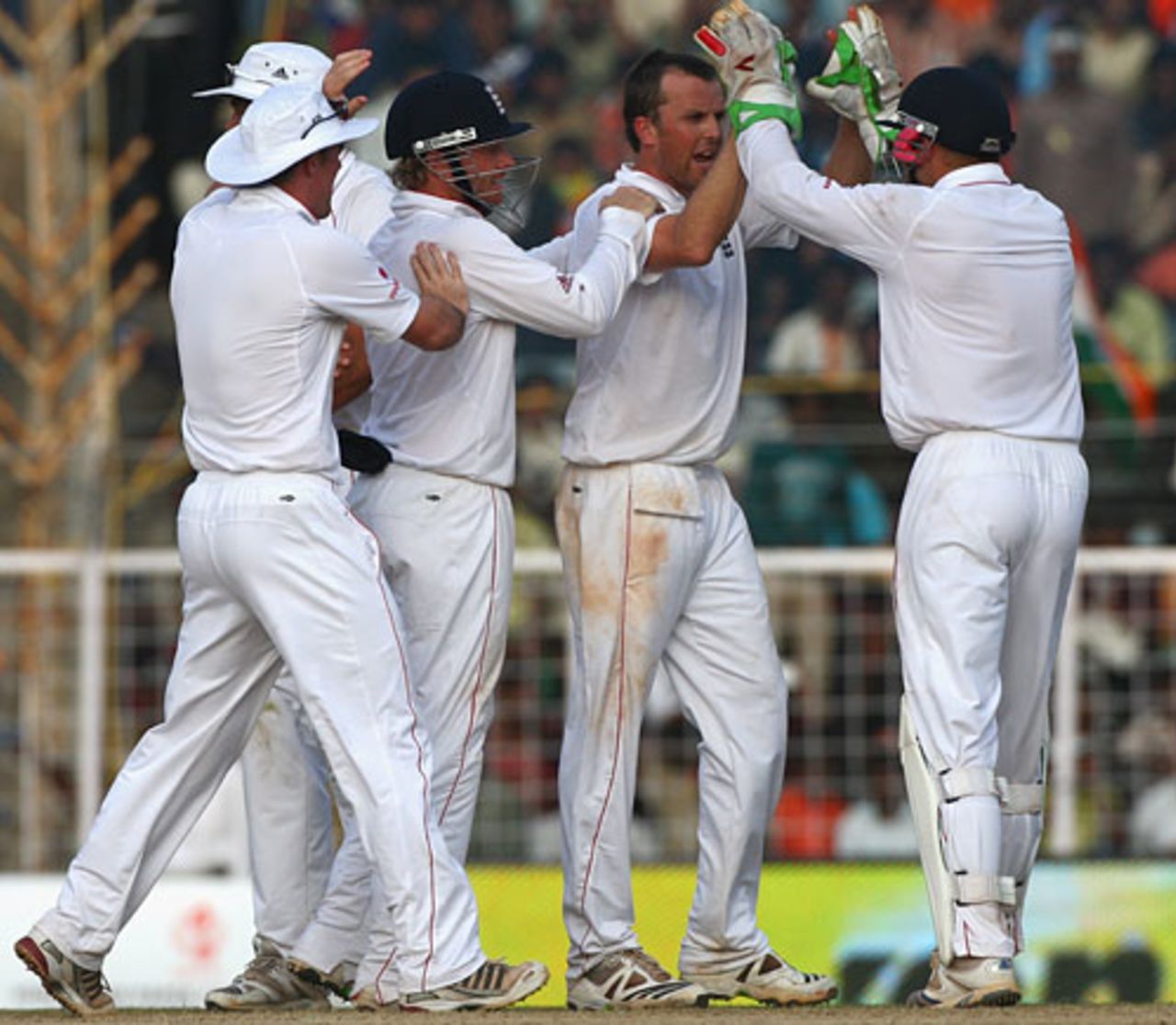 Graeme Swann is congratulated by his team-mates after dismissing Virender Sehwag, India v England, 1st Test, Chennai, 4th day, December 14, 2008