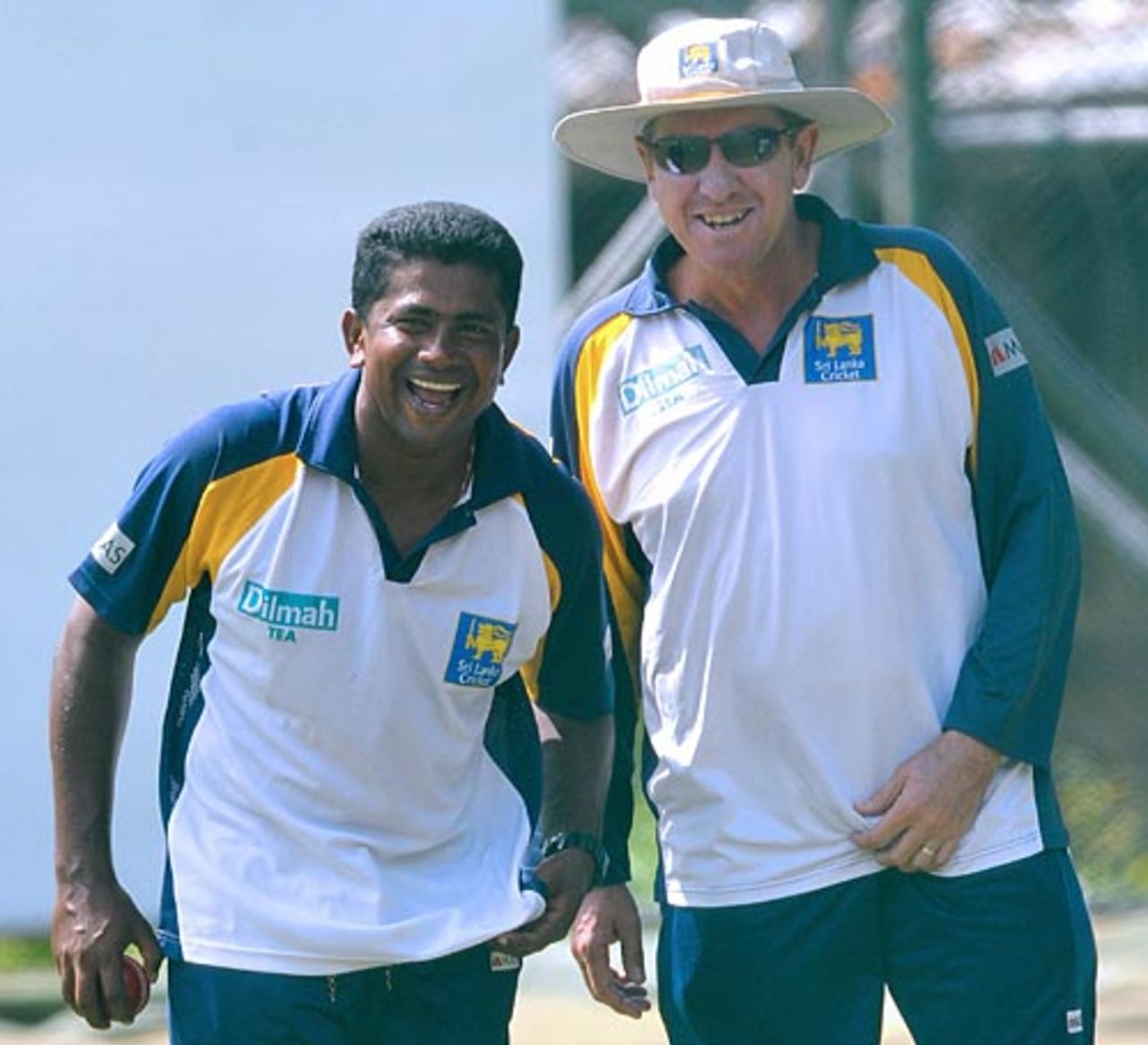 Rangana Herath and Trevor Bayliss share a joke, Colombo, December 16, 2008