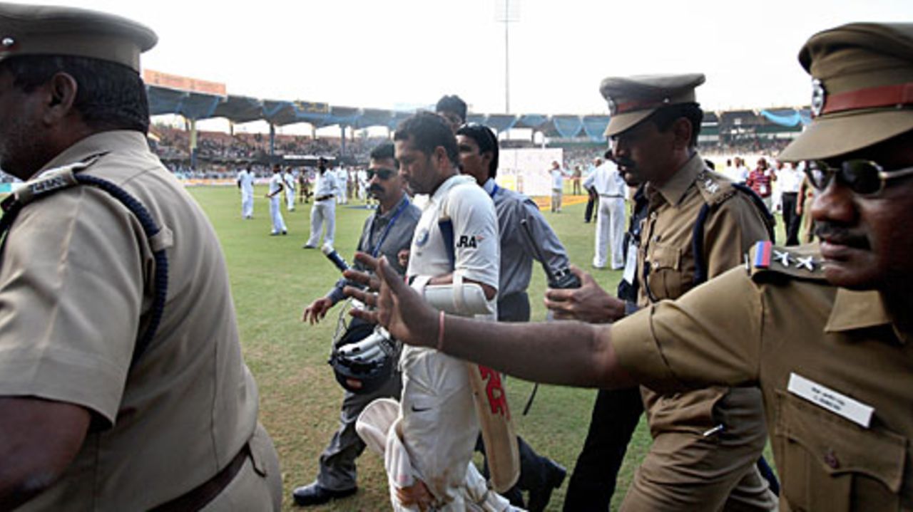 Sachin Tendulkar is escorted out of the field by policemen, India v England, 1st Test, Chennai, 5th day, December 15, 2008