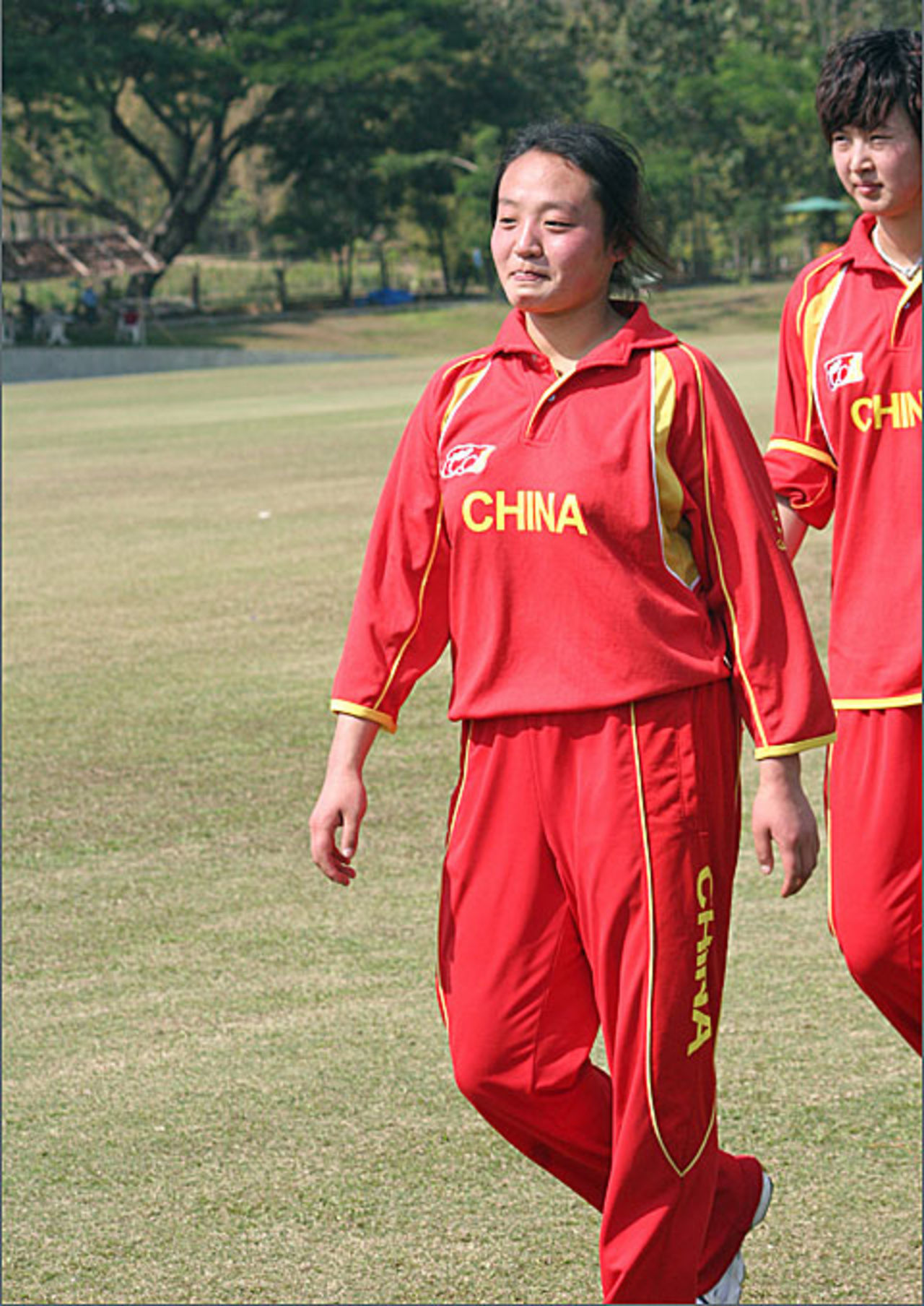 China captain Yu Miao walks back after her side's defeat to Singapore, China v Singapore, Prem Oval, ACC U-19 women's tournament, Thailand, December 15, 2008
