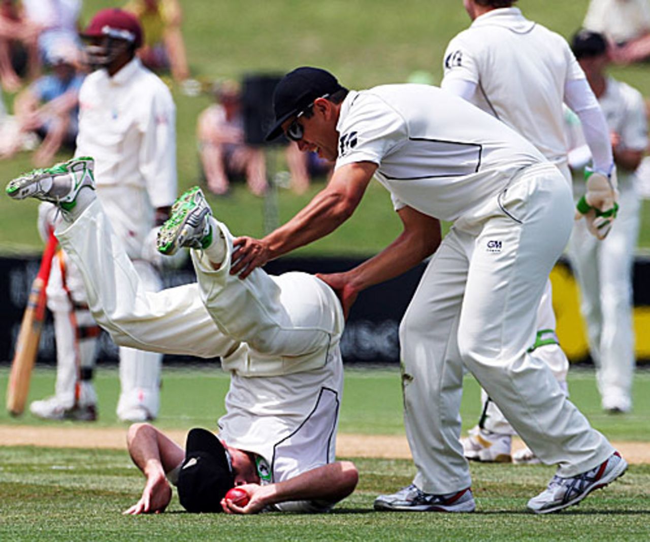 Jamie How falls over after taking a catch over his head, New Zealand v West Indies, 2nd Test, Napier, 1st day, December 19, 2008