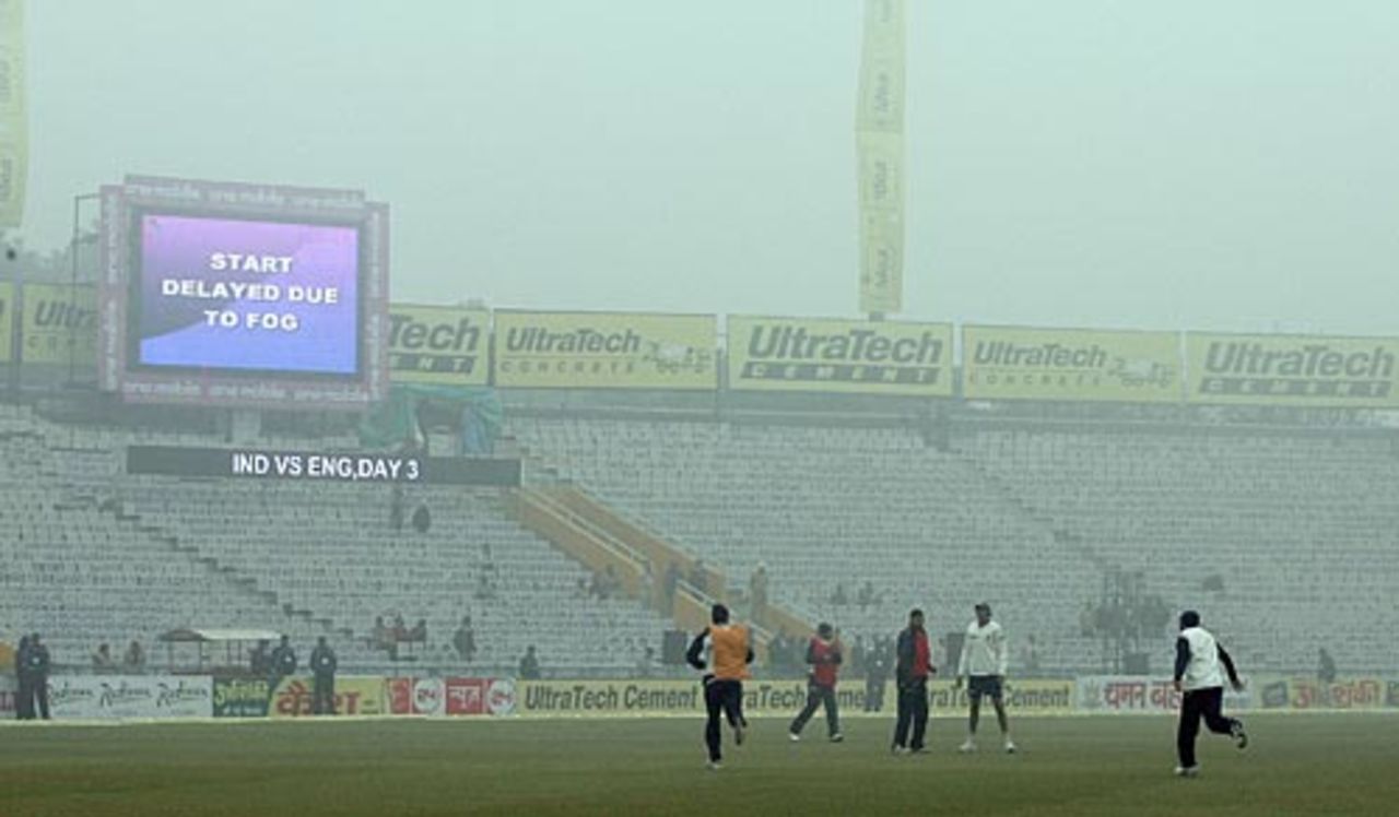 Players warm up as the fog refuses to clear, India v England, 2nd Test, Mohali, 3rd day, December 21, 2008