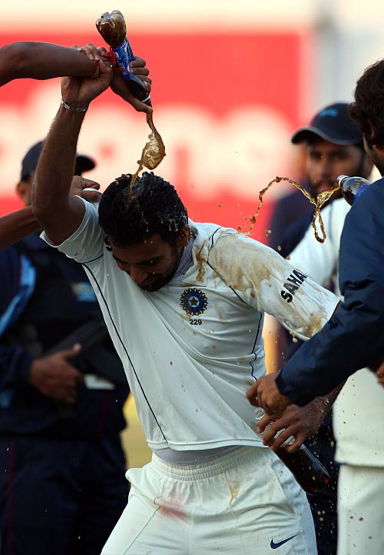 Zaheer Khan gets doused before going up to get his Man-of-the-Series award, India v England, 2nd Test, Mohali, 5th day, December 23, 2008