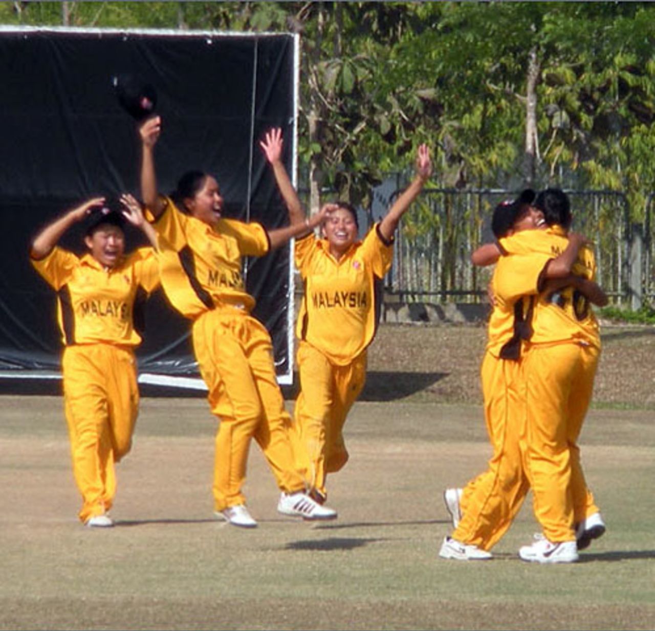 Malaysia are ecstatic after qualifying for the final, Hong Kong v Malaysia, Prem Oval, ACC U-19 women's semi-final, Thailand, December 22, 2008