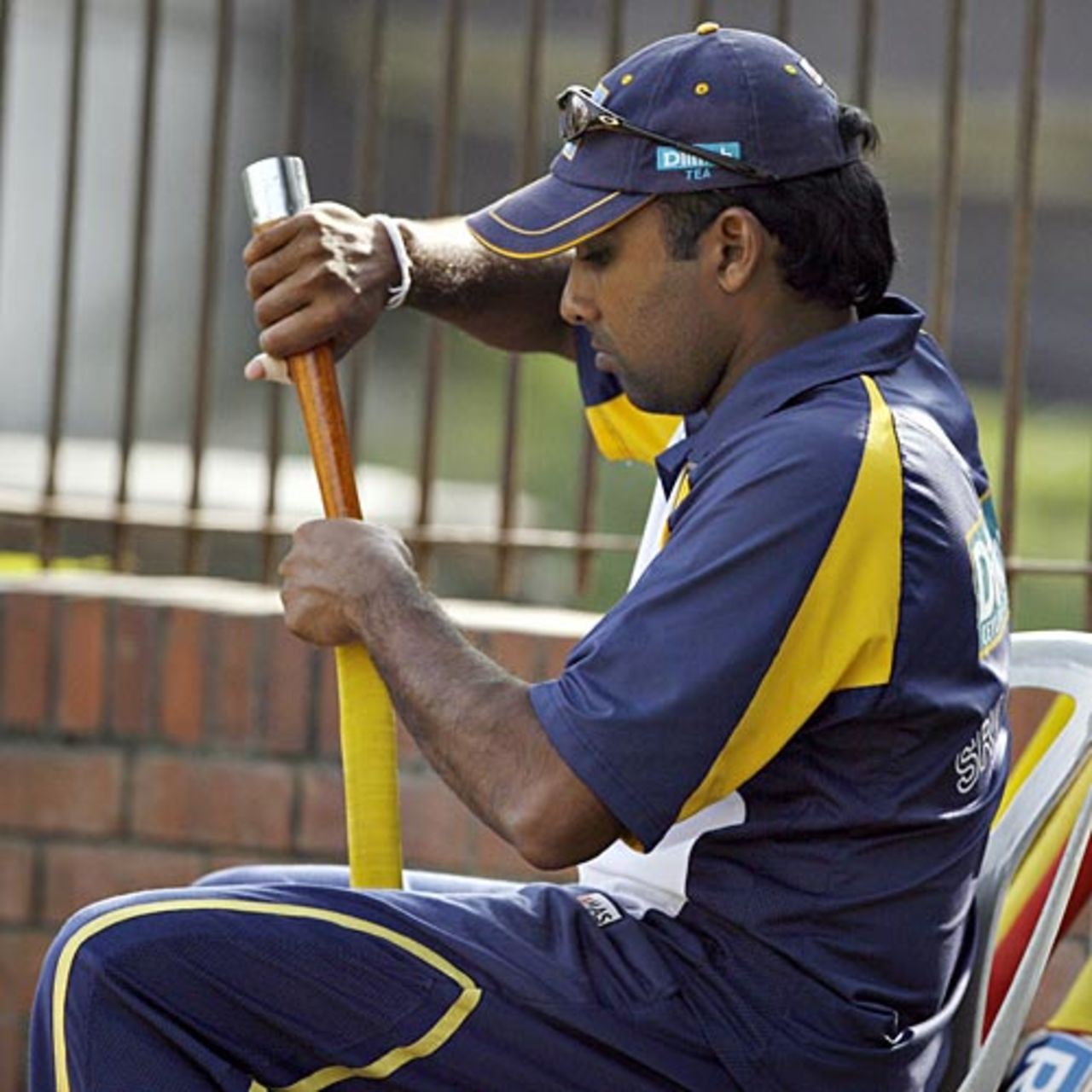 Mahela Jayawardene tests the bat grips during the nets session, Dhaka, December 25, 2008