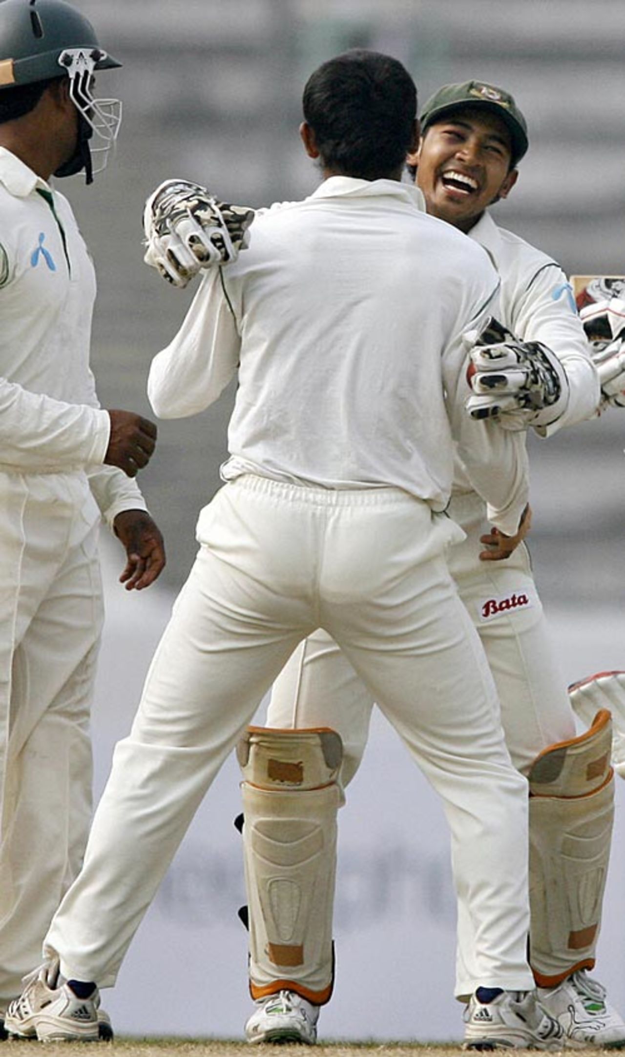 Mehrab Hossain jnr gets a hug from Mushfiqur Rahim after dismissing Kumar Sangakkara, Bangladesh v Sri Lanka, 1st Test, Mirpur, 3rd day, December 28, 2008