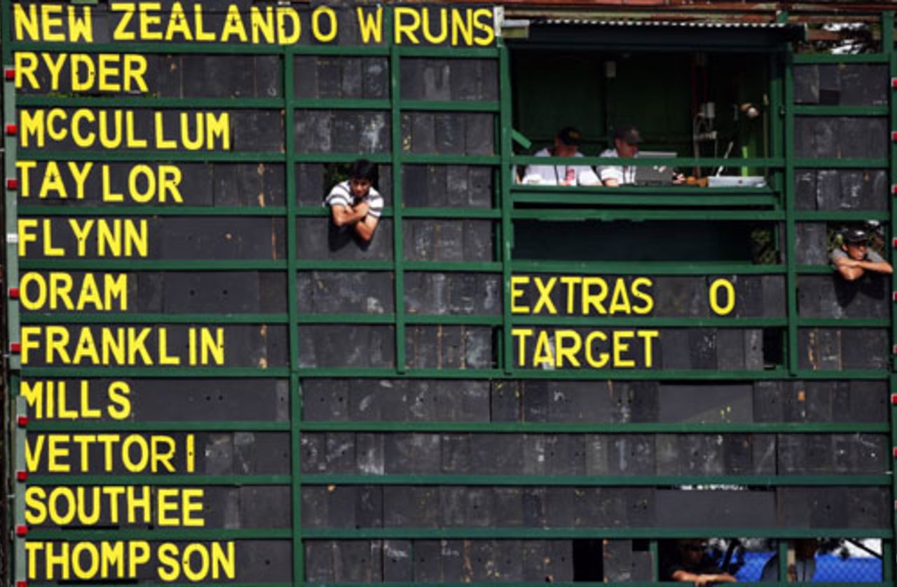 Scorers watch the match from the old scorecard, New Zealand v West Indies, 2nd Twenty20, Hamilton, December 28, 2008