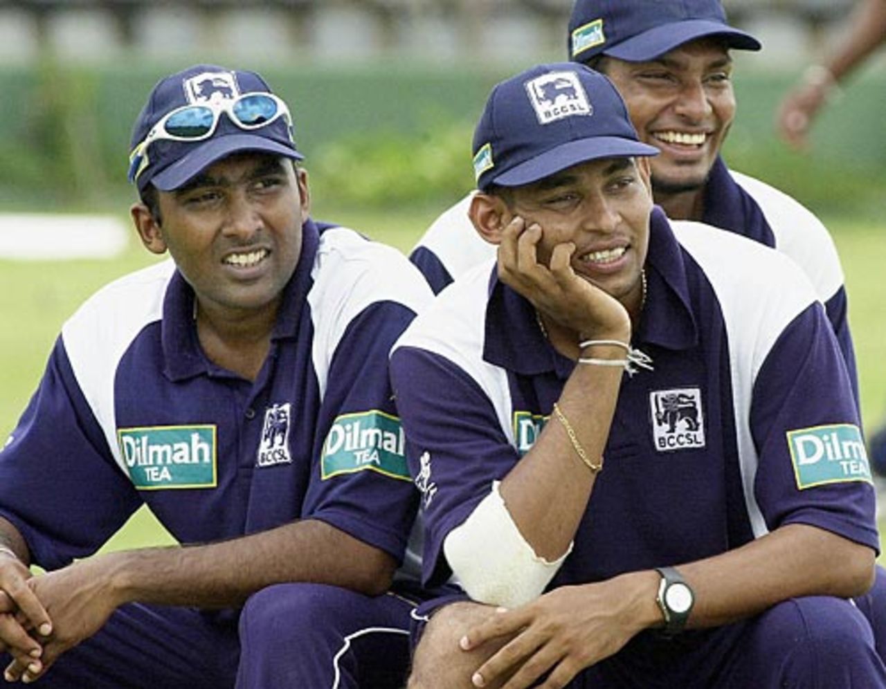 Mahela Jayawardene, Tillakaratne Dilshan and Kumar Sangakkara share a joke during practice, Dambulla, May 13, 2003