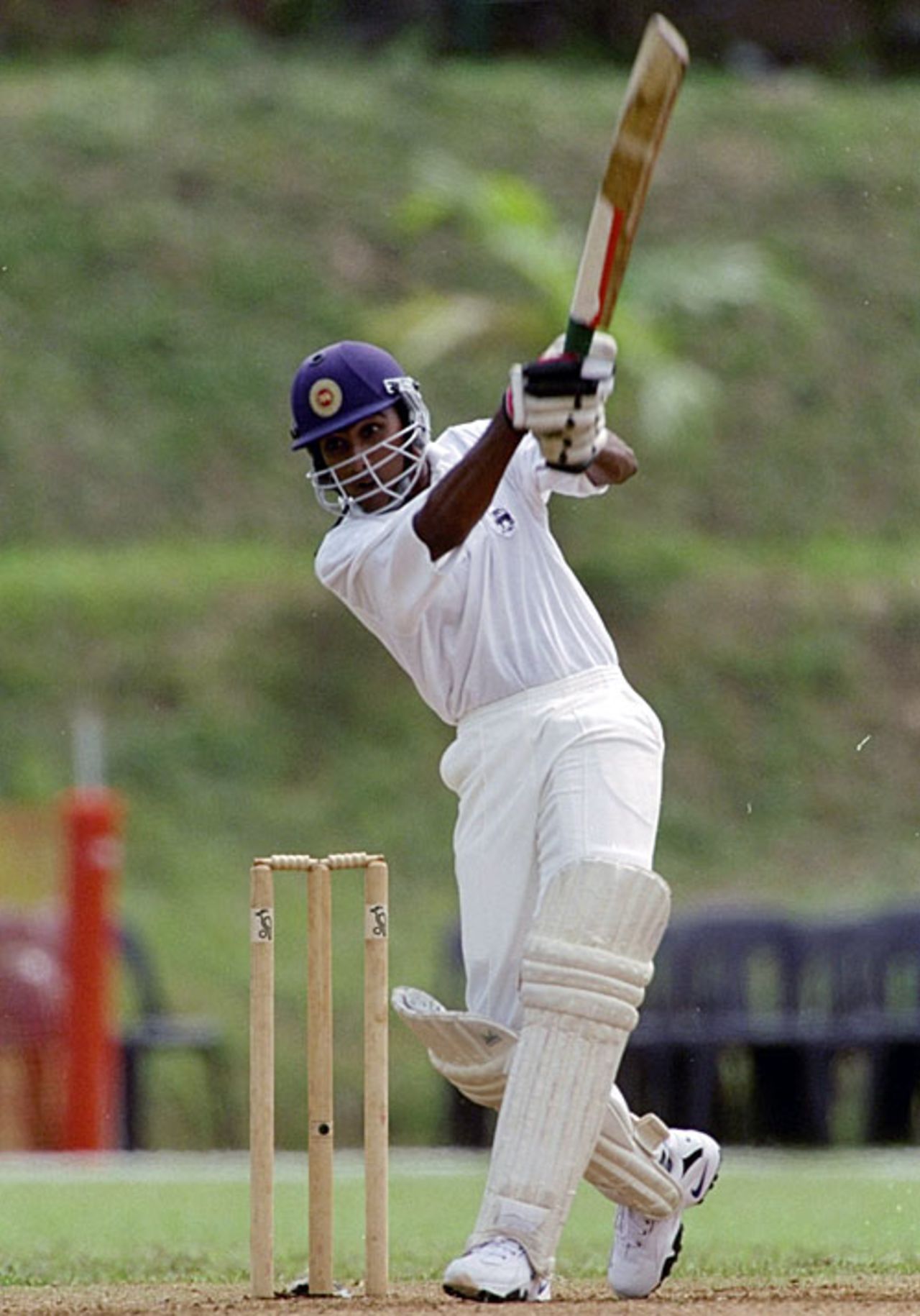 Mahela Jayawardene lifts the ball over mid-off, Commonwealth Games, Kuala Lumpur, September 16, 1998