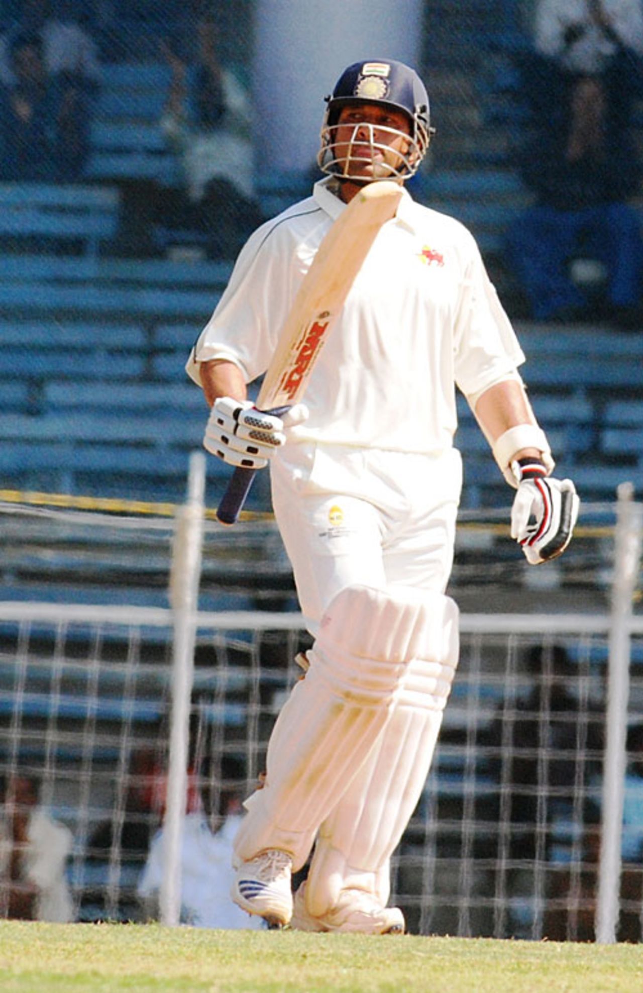 Sachin Tendulkar raises the bat after getting to his hundred, Mumbai v Saurashtra, Ranji Super League semi-final, 2nd day, Chennai, January 5, 2009