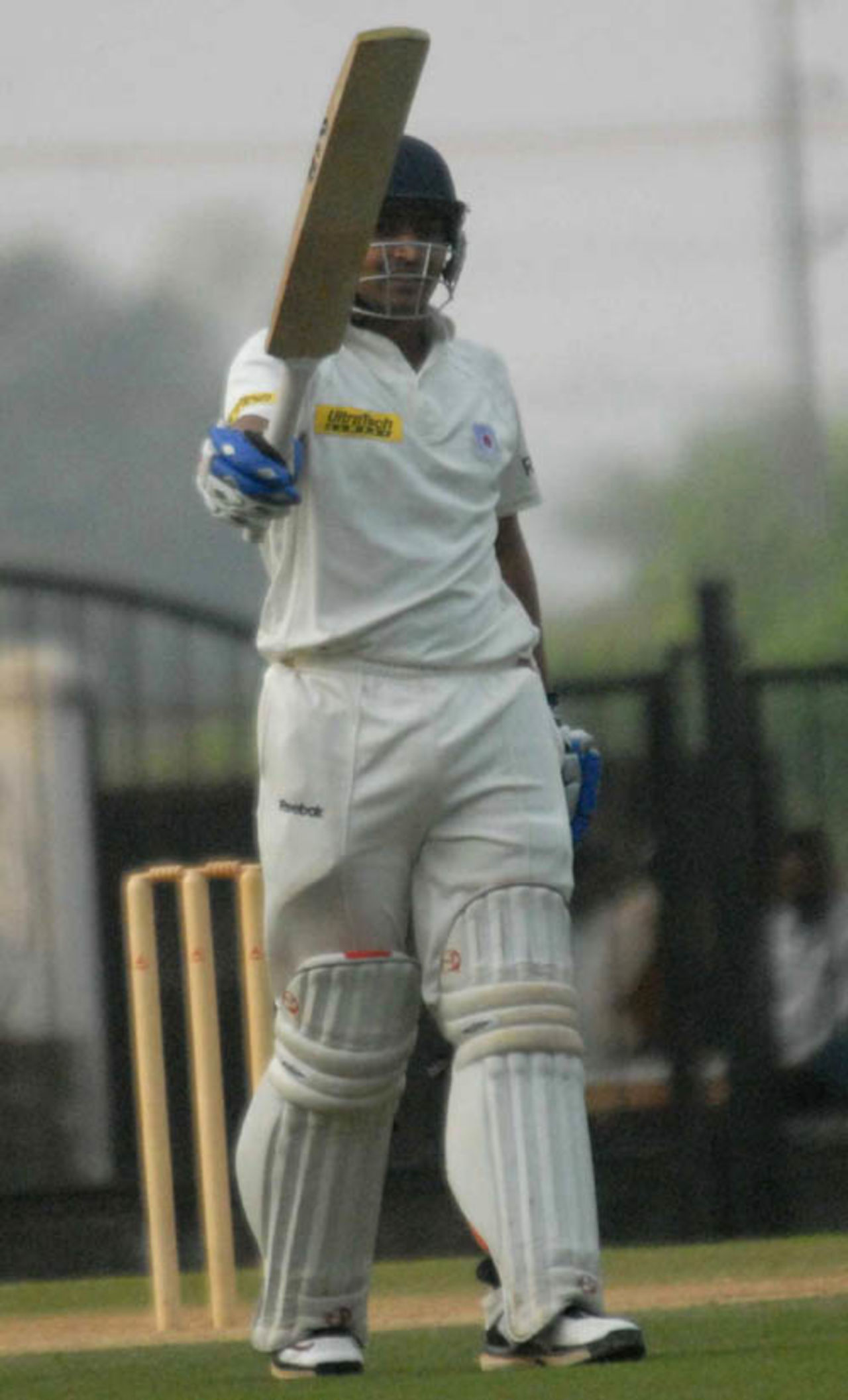 Shivakant Shukla raises his bat after reaching his century, Tamil Nadu v Uttar Pradesh, Ranji Super League semi-final, 3rd day, Nagpur, January 6, 2009