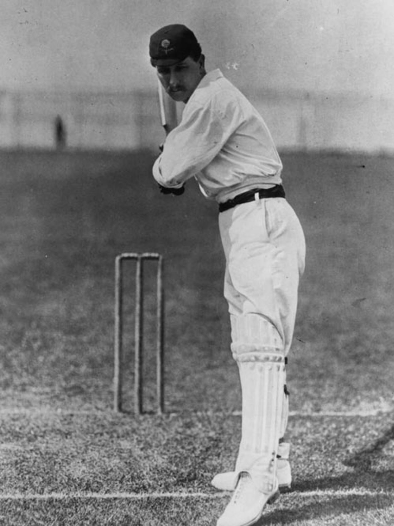 Johnny Tyldesley gets ready to play a stroke, 1905