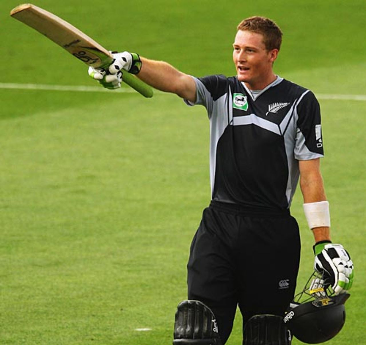 Martin Guptill raises his bat after reaching a century on debut, New Zealand v West Indies, 4th ODI, Auckland, January 10, 2009