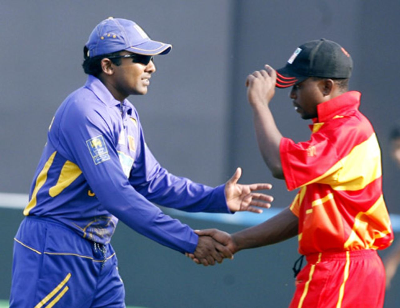 Mahela Jayawardene and Prosper Utseya exchange pleasantries following the game, Sri Lanka v Zimbabwe, Tri-series, 2nd match, Mirpur, January 12, 2009