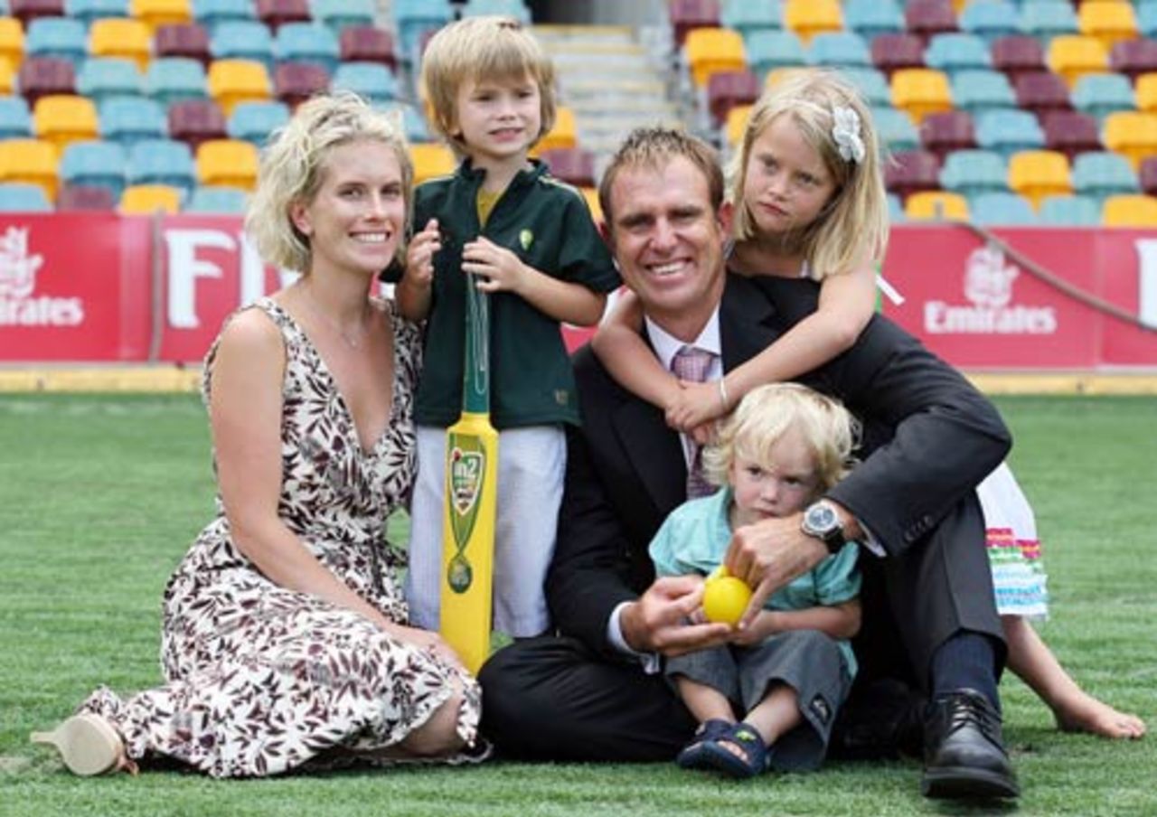 After announcing his retirement, Matthew Hayden poses on the Gabba with his wife Kellie and their children Joshua, Thomas and Grace, Brisbane, January 13, 2009