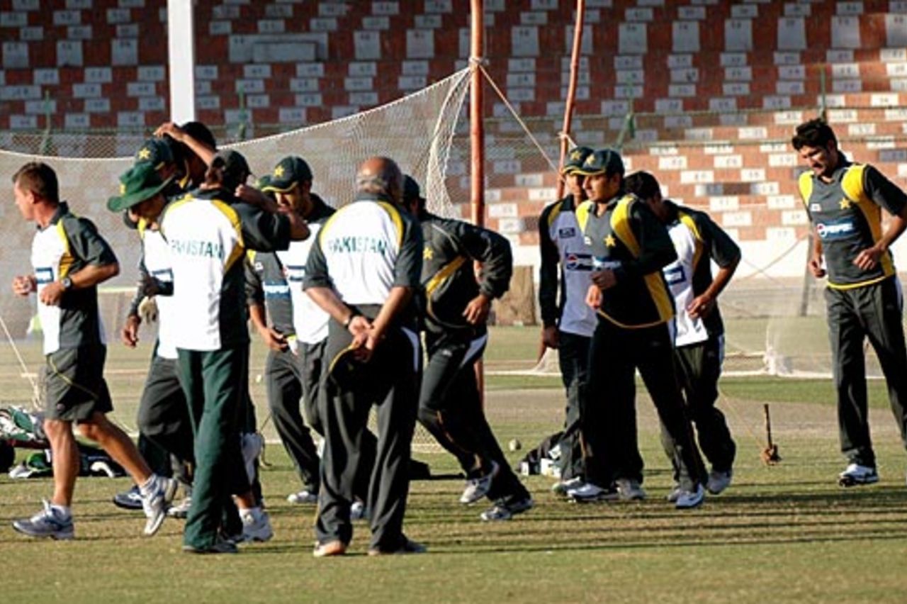 Pakistan players loosen up before the nets session, Karachi, January 19, 2008