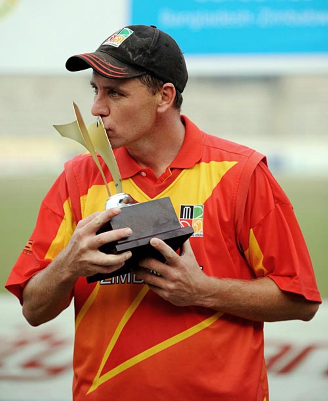 Ray Price kisses the Man of the Match trophy, Bangladesh v Zimbabwe, 1st ODI, Mirpur, January 19, 2009