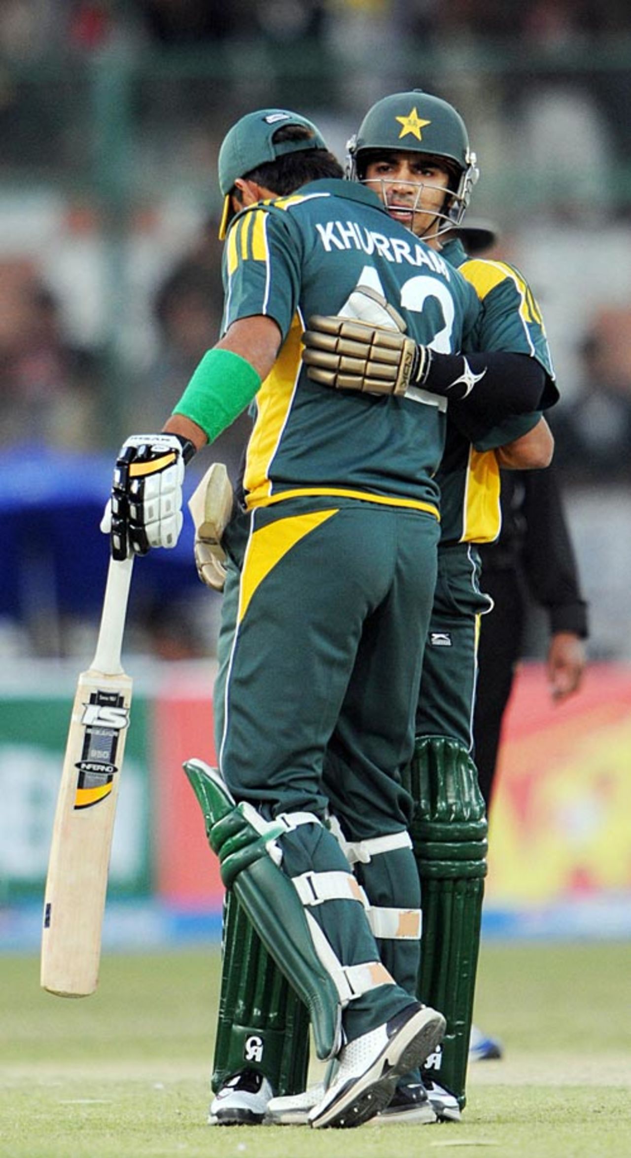 Salman Butt gets a hug from Khurram Manzoor after bringing up his fifty, Pakistan v Sri Lanka, 1st ODI, Karachi, January 20, 2009