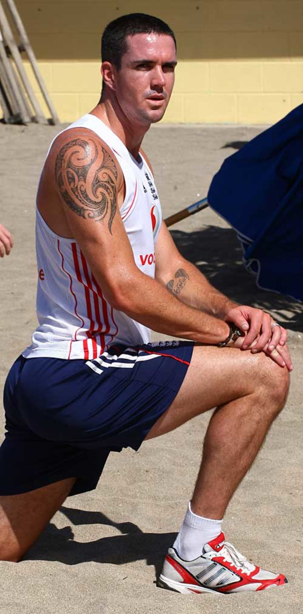 Back in the ranks: Kevin Pietersen has a stretch on the beach, St Kitts, January 22, 2009