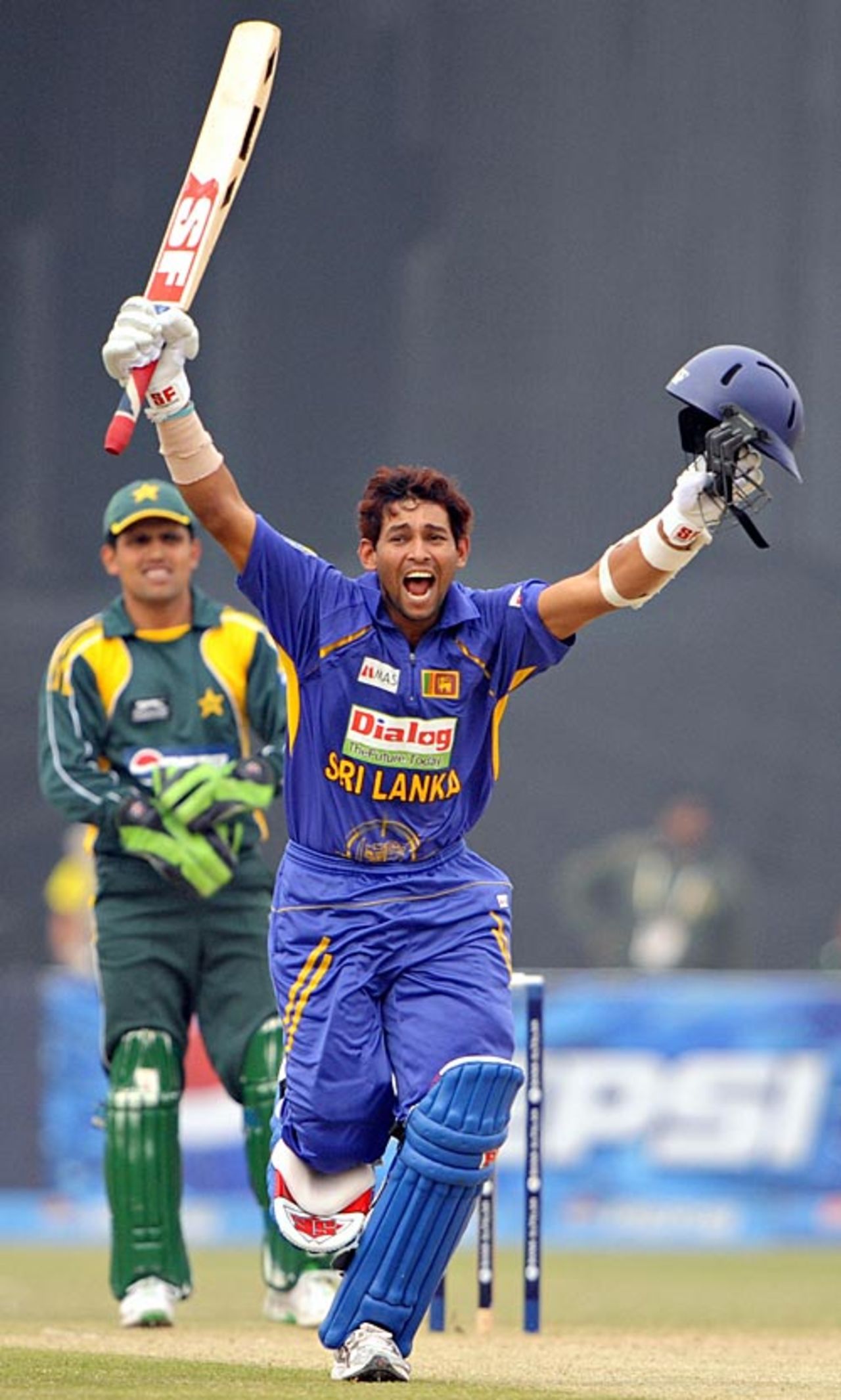 Tillakaratne Dilshan raises his arms after reaching his hundred, Pakistan v Sri Lanka, 3rd ODI, Lahore, January 24, 2009