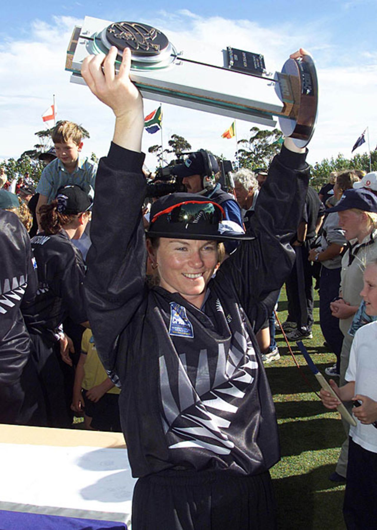 Emily Drumm holds the winners' trophy, New Zealand v Australia, World Cup final, Lincoln, December 23, 2000