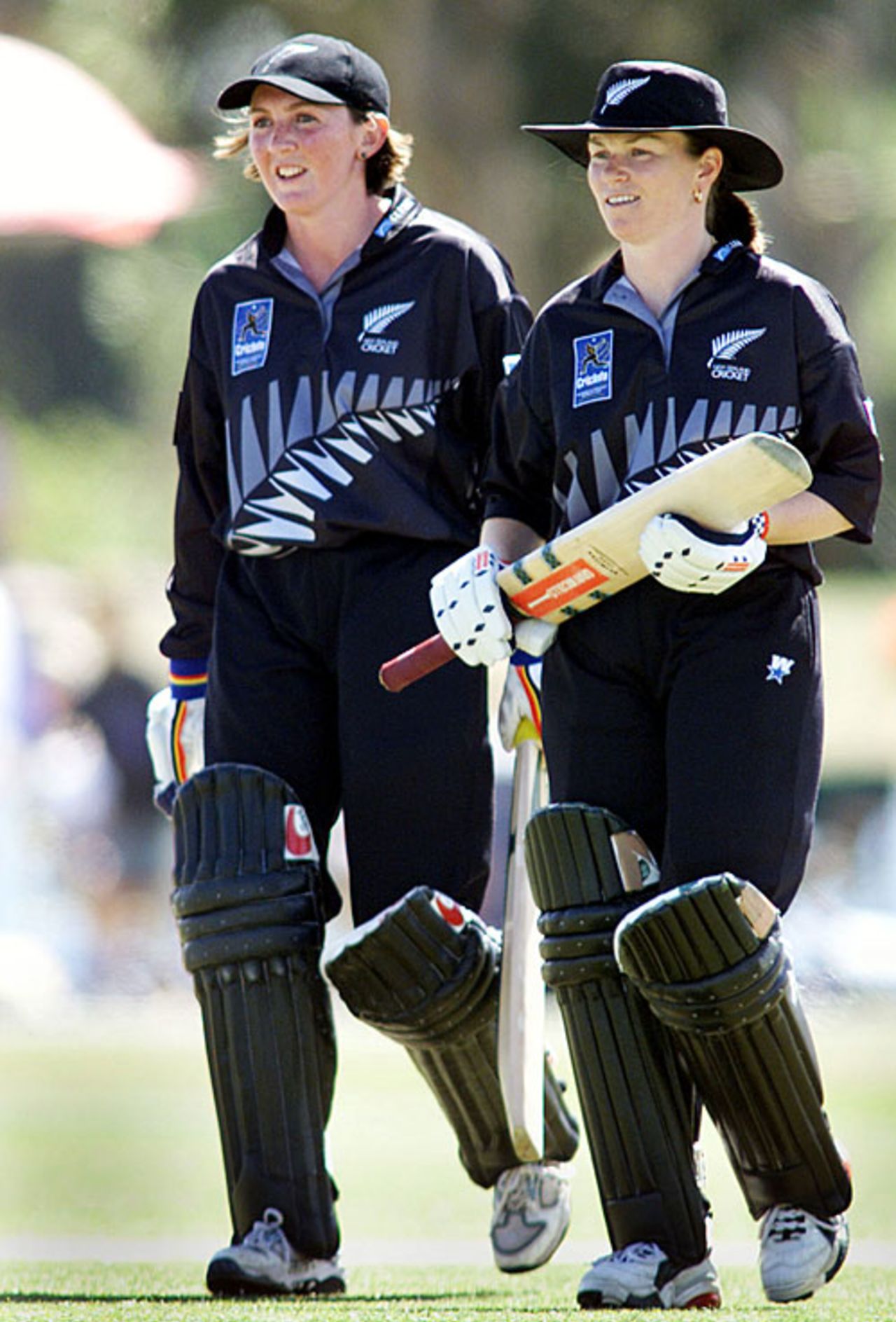 Anna O'Leary and Emily Drumm walk back after 86-run unbeaten stand, New Zealand v India, Women's World Cup semi-final, Lincoln, December 20, 2000