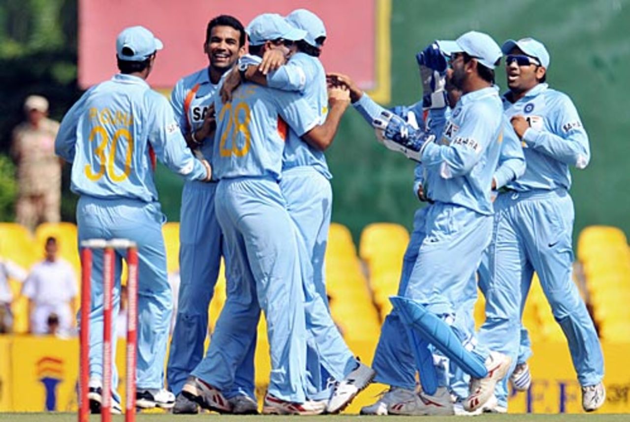 Team-mates rush in to congratulate Yusuf Pathan after he ran out Tillakaratne Dilshan, Sri Lanka v India, 1st ODI, Dambulla, January 28, 2009